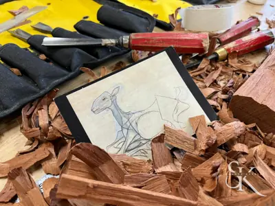 Gubias y dibujo de referencia sobre el banco